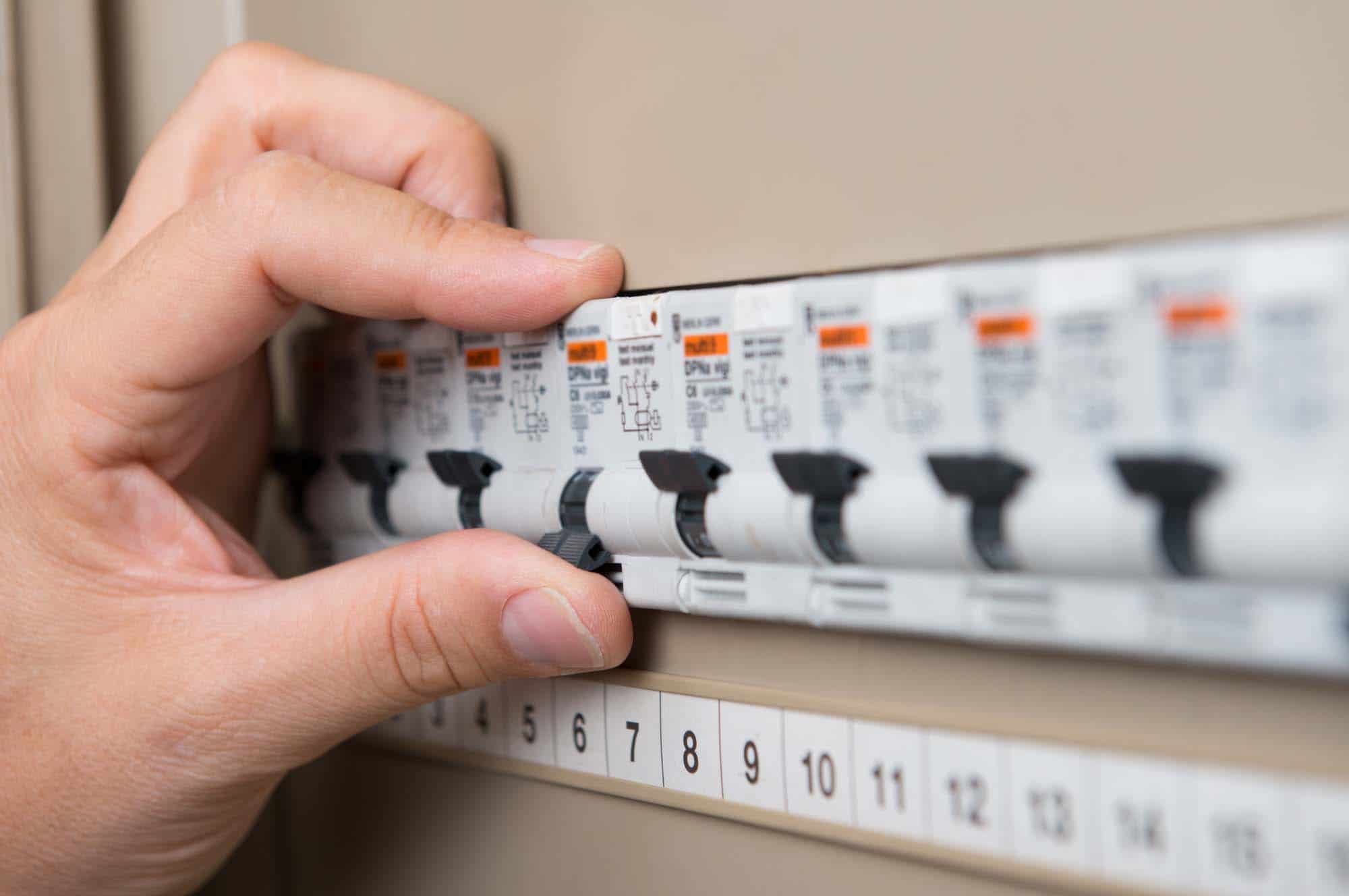 Electrician Testing The Switchboard